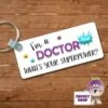 Rectangular Keyring Showing "I'm A Doctor What's Your Superpower?" 1 Rectangular Keyring Showing "I'm A Doctor What's Your Superpower?" -CheekyNeep Store rectangular plastic two sided keyring superpower doctor CN 0008 0037 by cheekyneep.com