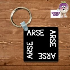 Square Keyring Showing "Arse"