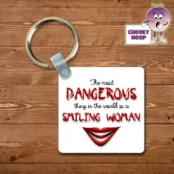 Square Keyring Showing "The Most Dangerous....Smiling Woman"