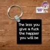 Square Keyring Showing "The Less You Give A Fuck The Happier You Will Be" -CheekyNeep Store square plastic two sided keyring the less you give a CN 0007 0177 by cheekyneep.com
